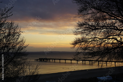 Sonnenuntergang mit Seebrücke am Strand von Bansin auf der Insel Usdom Mecklenburg-Vorpommern photo