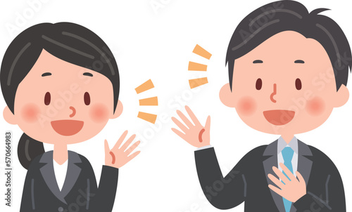 笑顔で会話する会社員の男女