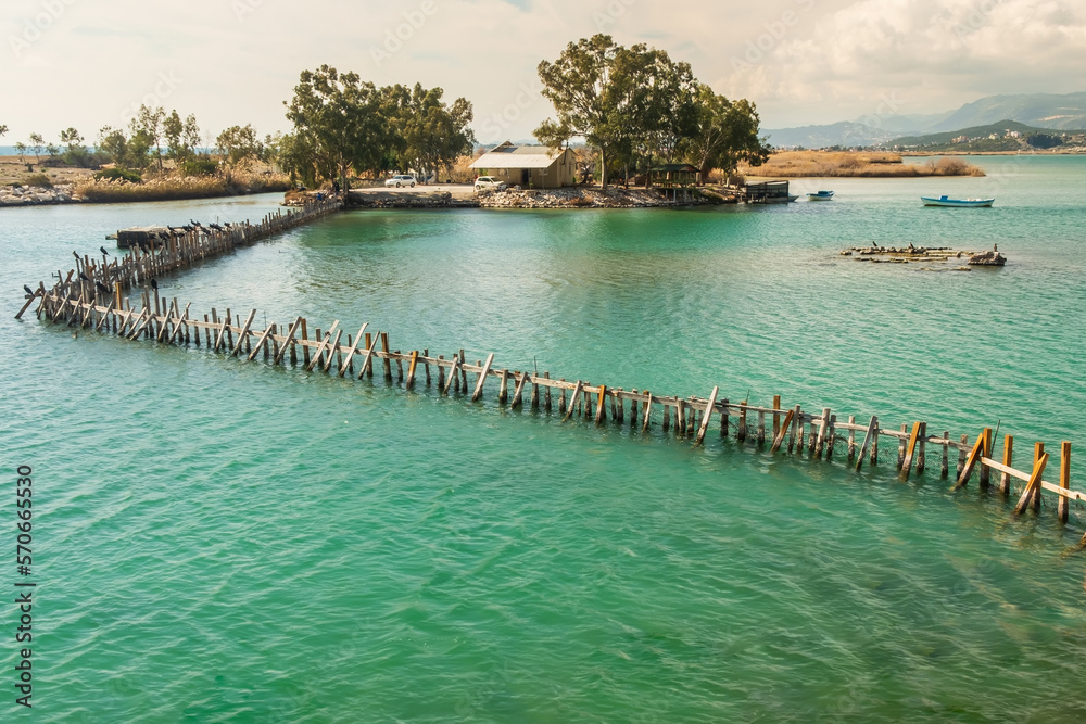 Small island and boats in the sea