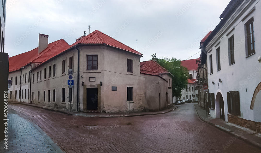 Wet paved roads of Lydos and Prancishkonu streets in Vilnius Old Town