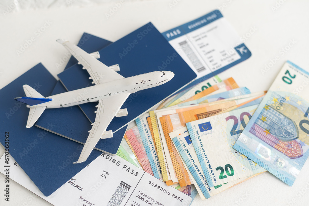 Airline tickets and documents on white background