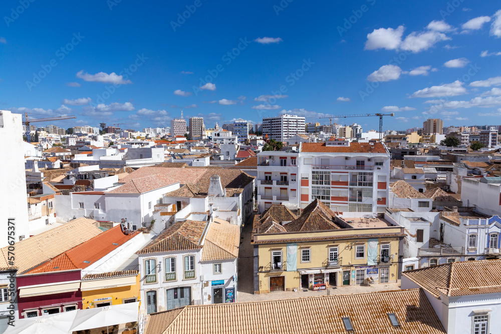 view to old town of Faro, Portugal, Algarve with mixture of modern and old traditional architecture.