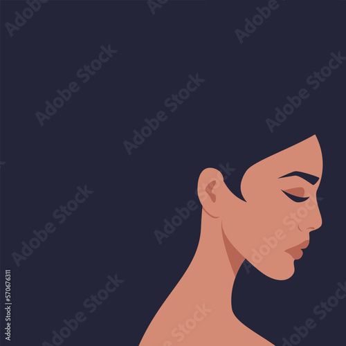 A sad woman with dark blue hair. A female face profile with an expression of the emotions of sadness, stress and depression.