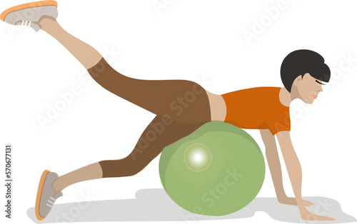 The girl is engaged in fitness. She performs an exercise on a gymnastic ball.