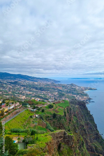 A picturesque view from a height of the green coast of madeira Island.