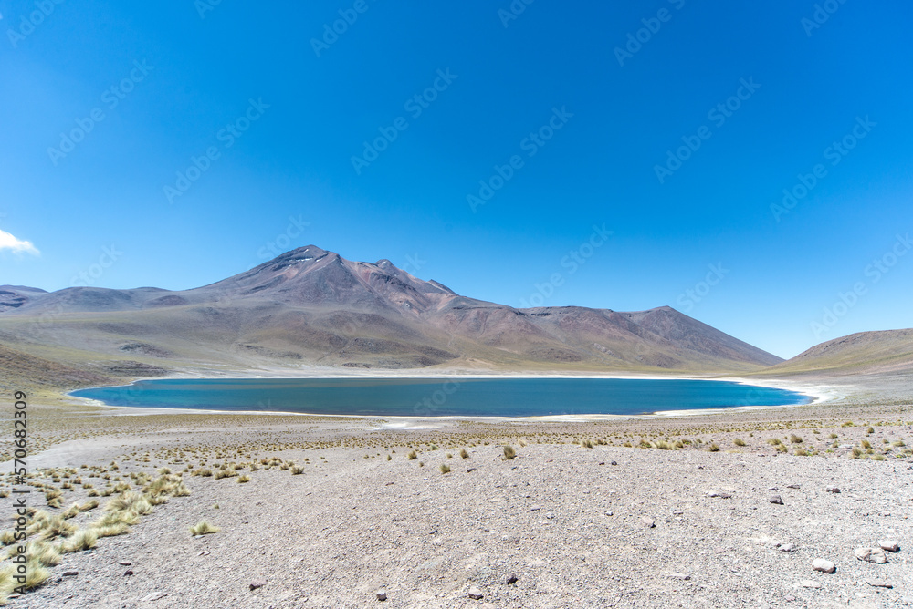 Deserto de Atacama lakes, salar. Landscape with view on a lake in the Desert of Atacama in Chile, near San Pedro de Atacama. Desolate barren unreal background. Deserto de Atacama lakes, salar. Landscape with view on a lake in the Desert of Atacama in Chile, near San Pedro de Atacama. Desolate barren unreal background.