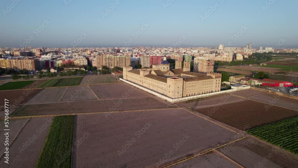 Aerial shoot over the farming plots with San Miguel de los Reyes monastery on the right and over Orriols neighborhood in Valencia City. Aerial shoot over the farming plots with San Miguel de los Reyes monastery on the right and over Orriols neighborhood in Valencia City.