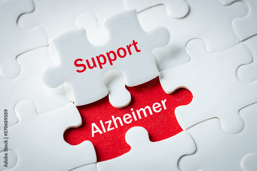 Fototapeta premium alzheimer's disease, Puzzle with exposed words Support and alzheimer, Concept, Help and support for elderly people struggling with progressive neurodegenerative disease