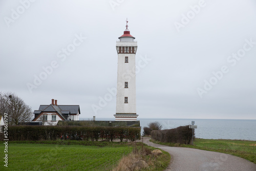The beautiful white lighthouse at Heln  s in Denmark