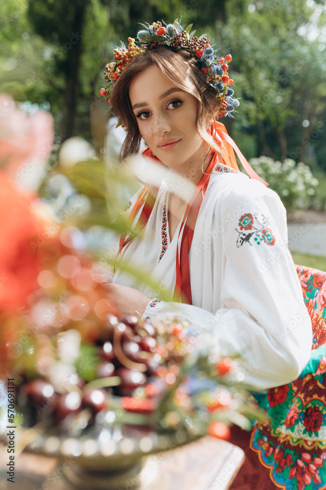 portrait of a girl in traditional Ukrainian clothes. A girl in an embroidered dress. Morning of the bride portrait of a girl in traditional Ukrainian clothes. A girl in an embroidered dress. Morning of the bride