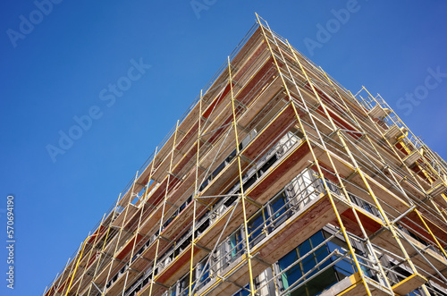 Scaffolding in front at the construction site of an office building