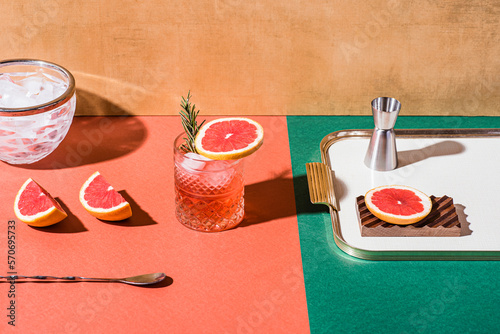 Wallpaper Mural Red cocktail in base of Campari or bitter with blood red oranges (tarocco) on the geometric  background. Aperitif with Americano or Negroni cocktail. Retro chic style Torontodigital.ca