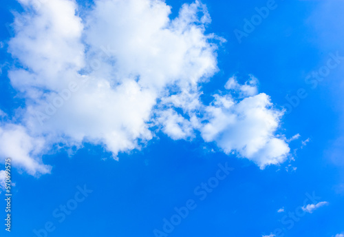 Air clouds in the blue sky. Blue sky background and white clouds. Summer blue sky. Space for free text