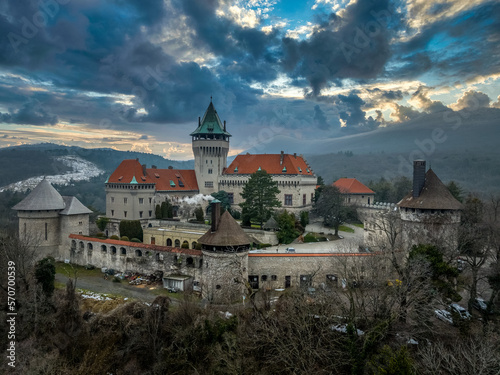 Smolenice Szomolany historic romantic castle on a hill with a surrounding park, guided tours & rental for special events in Slovakia with dramatic sunset sky