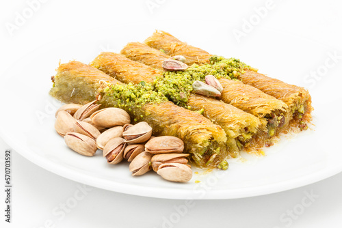 Burma kadayif with pistachio on a white plate photo