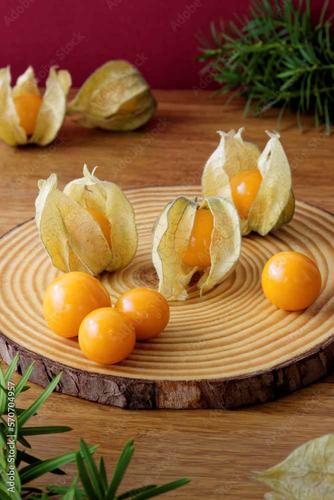 Fresh Physalis peruviana fruit. Healthy fruit snacks on a plate. Fresh Physalis peruviana fruit. Healthy fruit snacks on a plate.