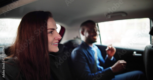 Smiling People Sitting Inside The Ride Sharing © Andrey Popov