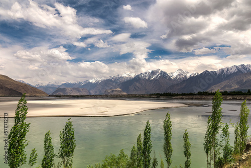 Indus river turning at skardu - the sand and turquoise water  photo