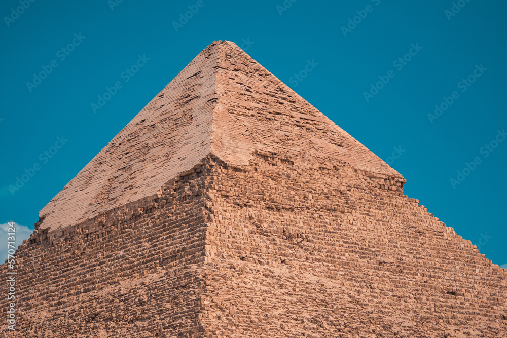close shot of peak of pyramids in giza close shot of peak of pyramids in giza