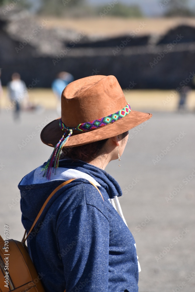 woman with a hat in a travel