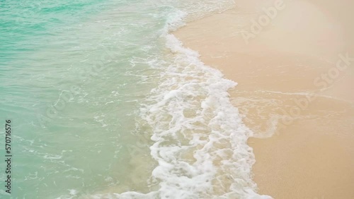 Turquoise tropical ocean waves on the beach