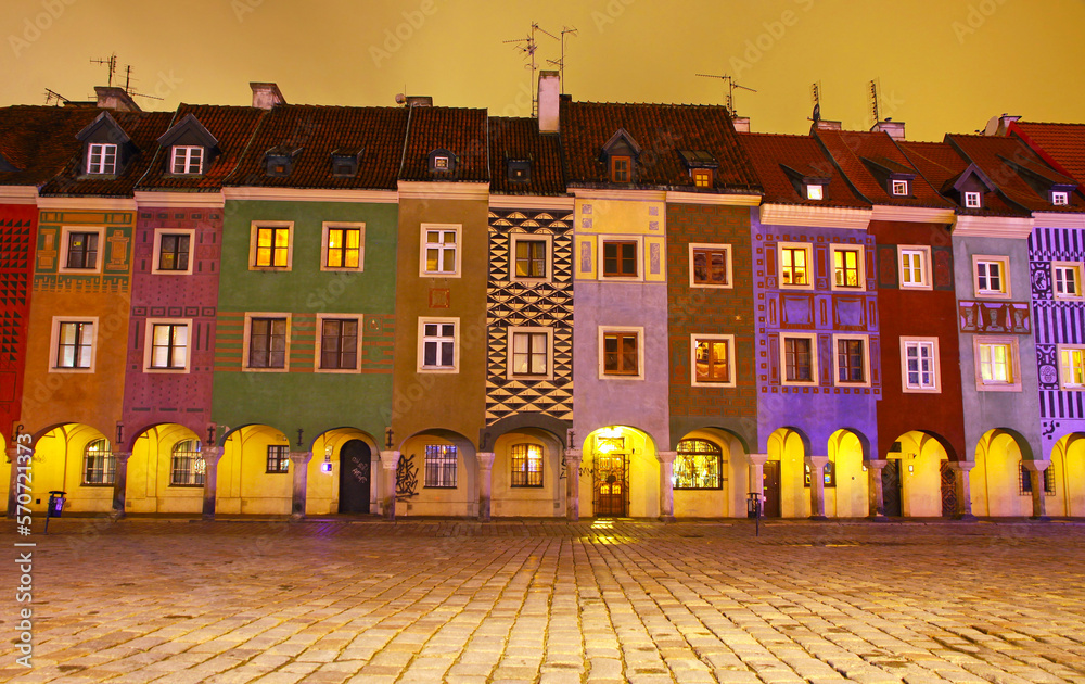 Night view of colourful houses in Old Market Square in Poznan, Poland