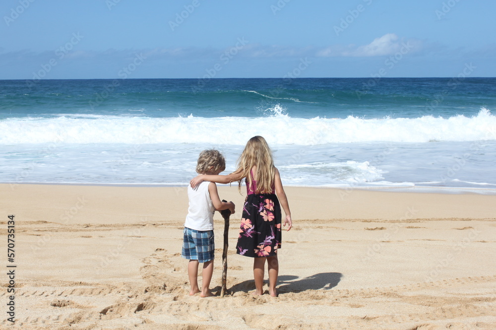 sisters embrace on the beach sisters embrace on the beach