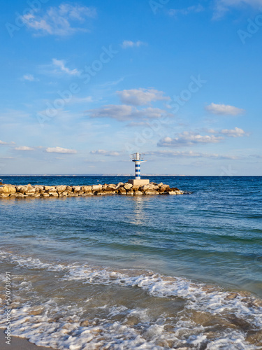 Landscape of the Mediterranean sea in Calvia. Beacon in Palmanova beach. Majorca, Balearic Islands, Spain, Europe photo