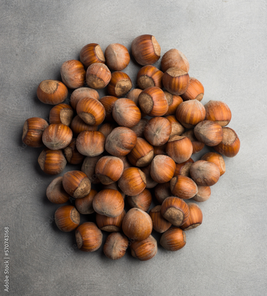 beautiful hazelnuts on a gray background