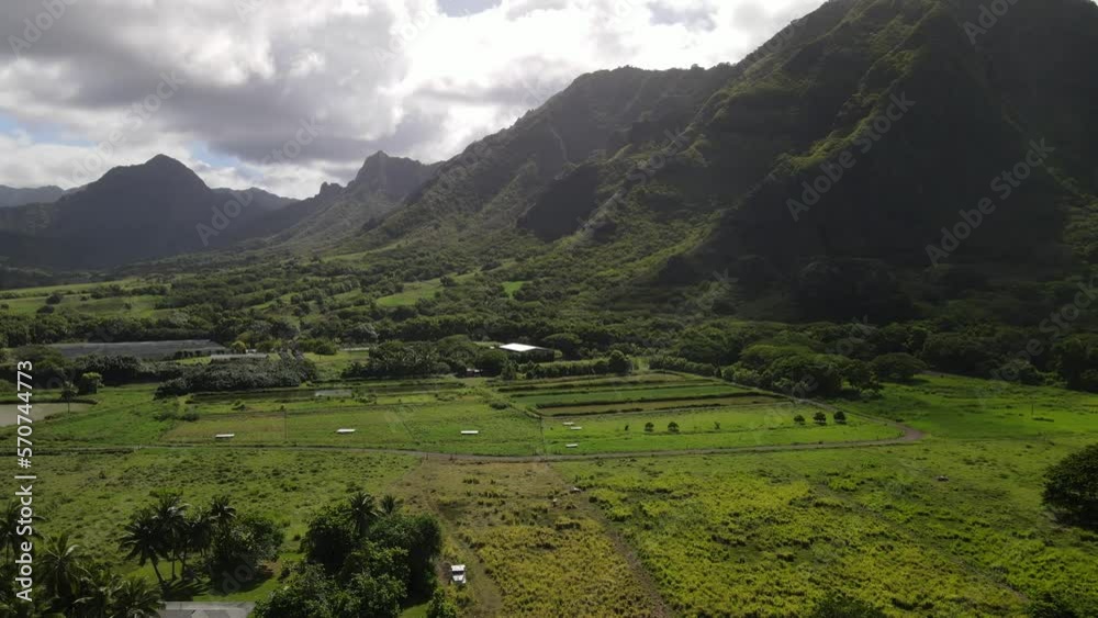 Hawaiian Island top view to mountain and ocean during summer time Hawaiian Island top view to mountain and ocean during summer time