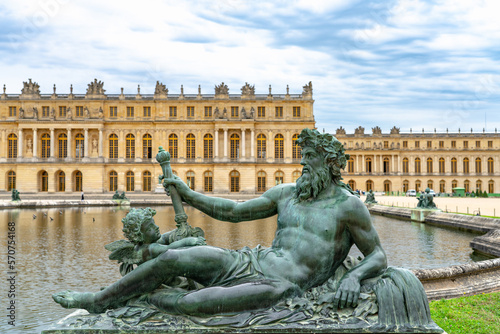 Palace Versailles with beautiful gardens and fountains from top. The Palace Versailles was a royal chateau. It was added to the UNESCO list of World Heritage Sites. Paris, France.