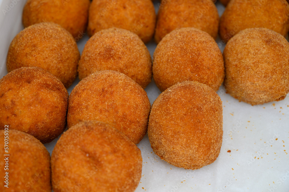 Traditional street food in UK, stuffed fried Scotch eggs with breadcrumbs