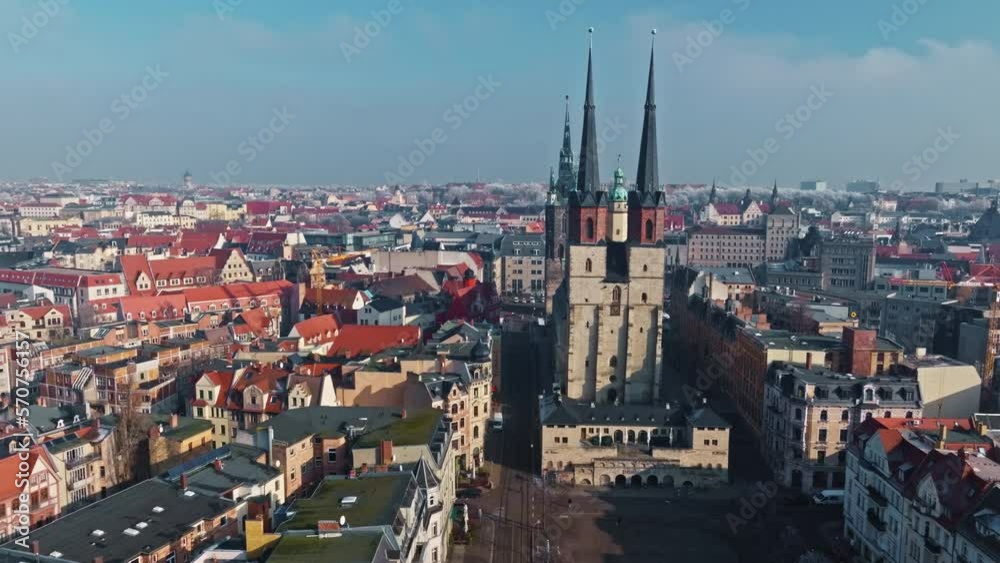 Drone shot revealing Marktkirche Unser Lieben Frauen (Market Church Of Our Lady), Halle (Saale) city , Saxony-Anhalt , Germany . Drone shot revealing Marktkirche Unser Lieben Frauen (Market Church Of Our Lady), Halle (Saale) city , Saxony-Anhalt , Germany .