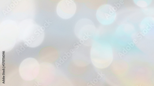 Abstract blurred grey background with bokeh.