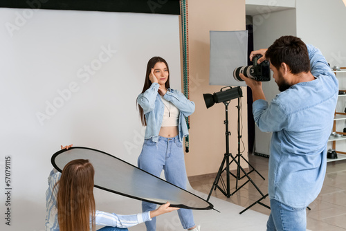 Male photographer and his a...