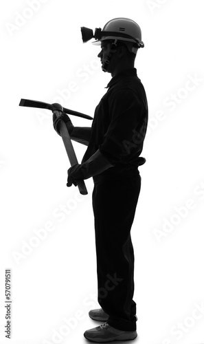 Silhouette of male miner with pick on white background
