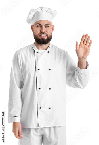 Male baker in uniform wavin...