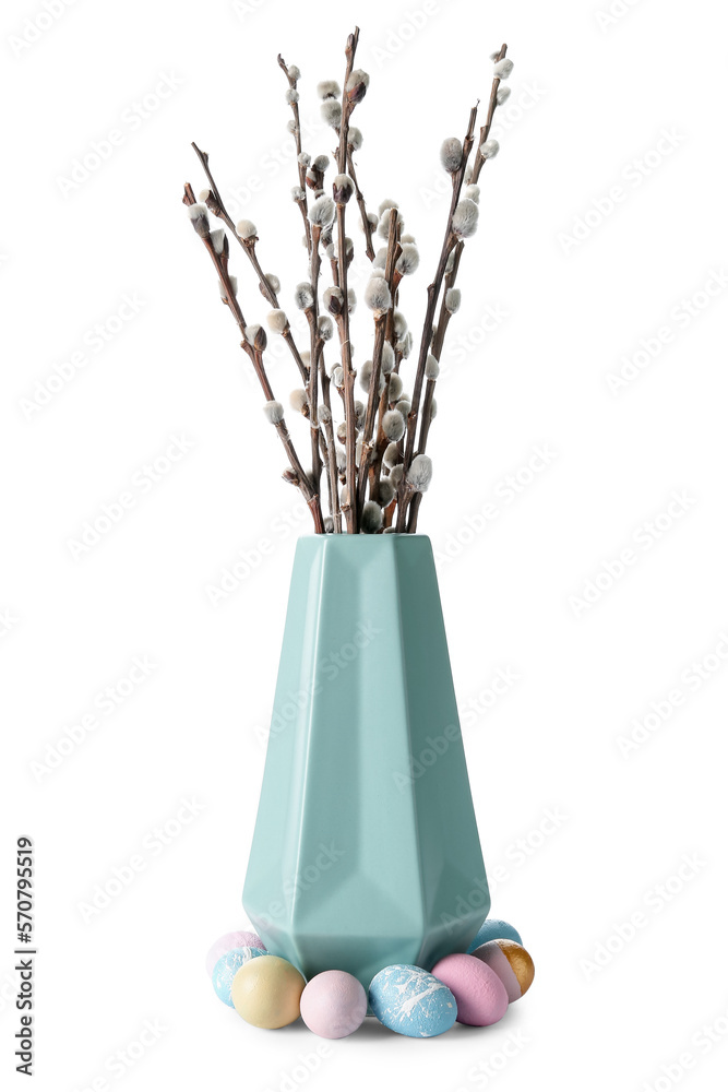 Vase with willow branches and Easter eggs isolated on white background