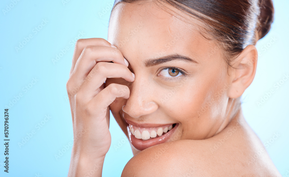 Portrait, skincare and woman in studio for beauty, wellness and cosmetics grooming on blue background. Face, skin and girl model relax in luxury, facial and dermatology, self care or hygiene isolated Portrait, skincare and woman in studio for beauty, wellness and cosmetics grooming on blue background. Face, skin and girl model relax in luxury, facial and dermatology, self care or hygiene isolated