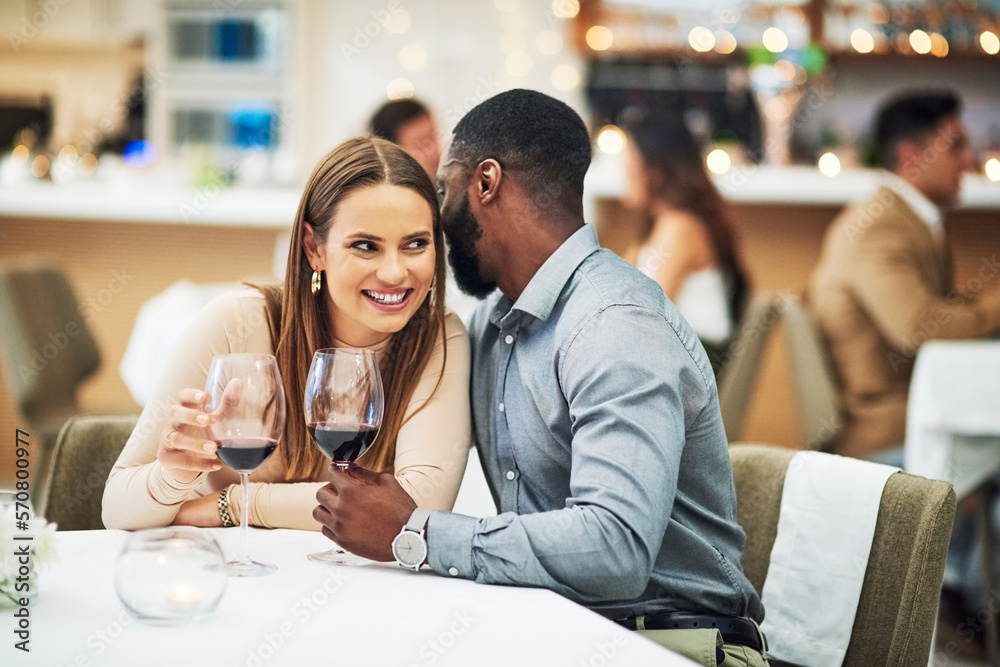 Restaurant date, interracial couple secret and wine celebration of a man at a dinner table. Anniversary happy, valentines day smile and drink at night with love, care and conversation together Restaurant date, interracial couple secret and wine celebration of a man at a dinner table. Anniversary happy, valentines day smile and drink at night with love, care and conversation together