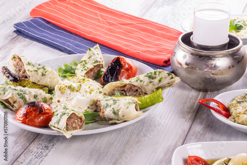 Turkish Beyti Kebap or kebab with grilled vegetables