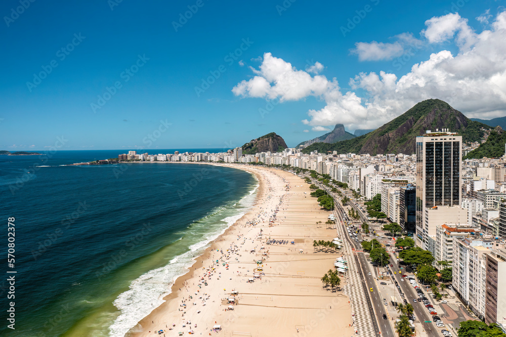 Aerial view of Copacabana Beach on sunny summer day. City skyline, Rio de Janeiro, Brazil