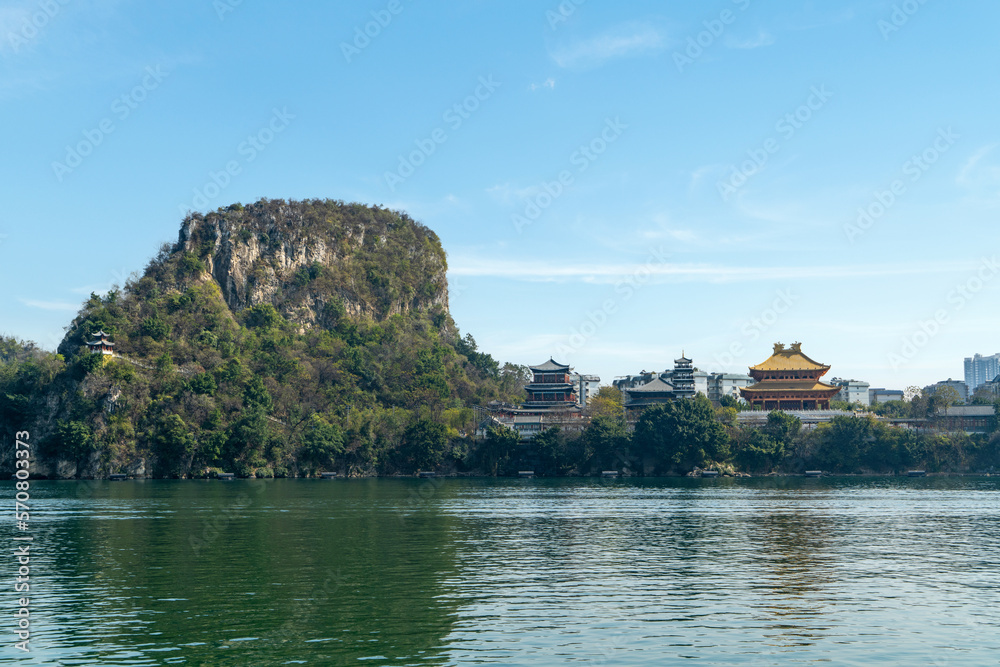 Temples and pagodas on riverside mountains, Liuzhou, Guangxi, China