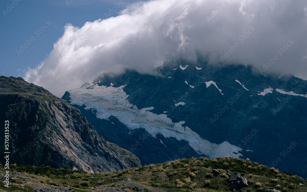 Glacier with mountains and cloud Glacier with mountains and cloud