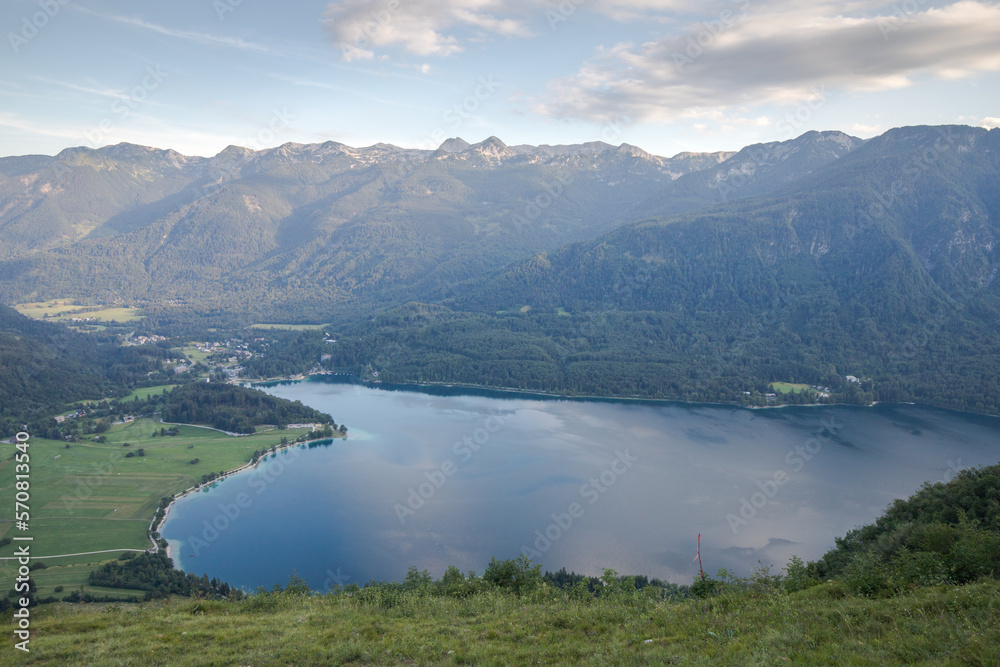 Summer at Lake Bohinj in the Julian Alps - view of the lake, surrounded by mountains