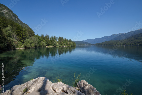 Summer at Lake Bohinj in the Julian Alps - a lake surrounded by mountains