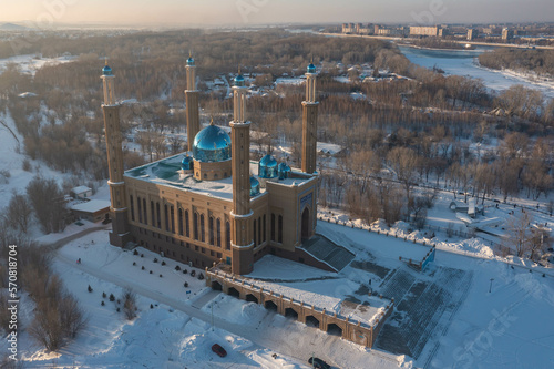 View of the city of Ust-Kamenogorsk (kazakhstan). Winter landscape. Factories chimneys. Cityscape photo