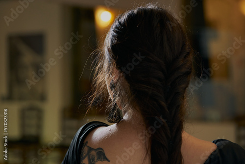 Young Woman Dancing Flamenco On Black photo