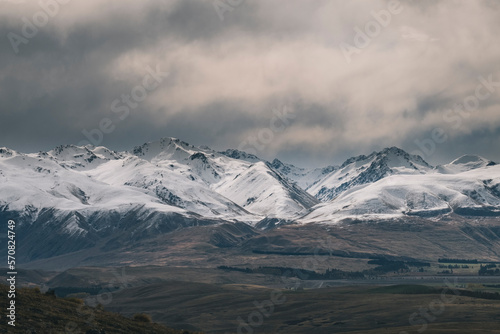 Rugged alpine mountains with snow capped peaks South Island New Zealand photo