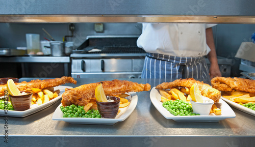 fish and chips prepared at commercial kitchen in the UK